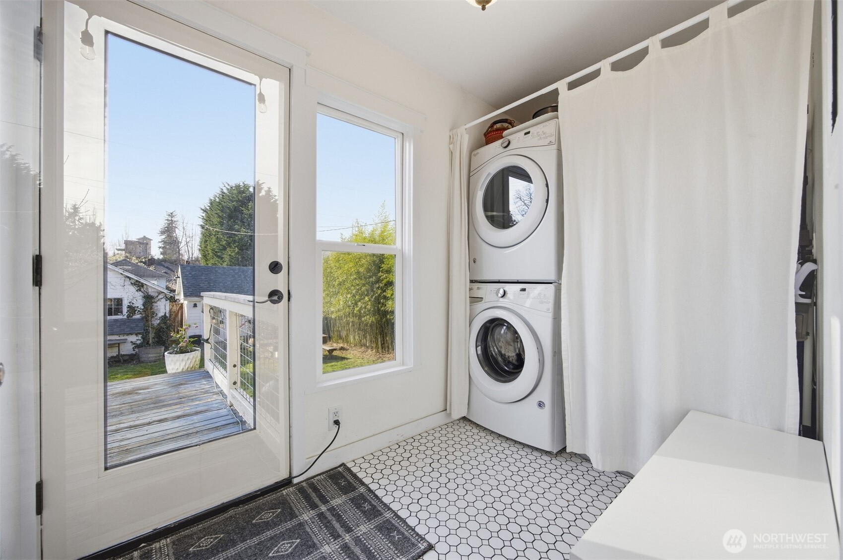 1205 Humboldt Street Bellingham, WA 98225 - Photo 24 of 40 a view of a storage and utility room with washer and dryer