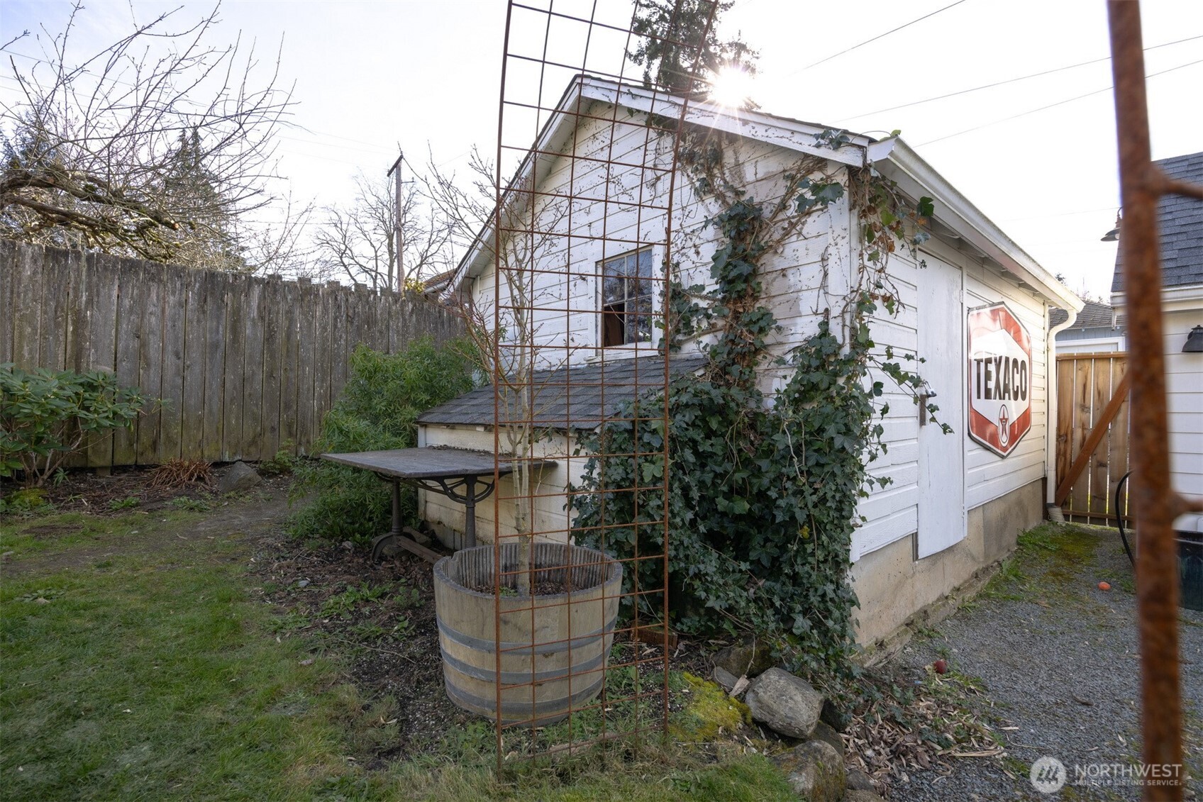 1205 Humboldt Street Bellingham, WA 98225 - Photo 33 of 40 a backyard of a house with fountain table and chairs
