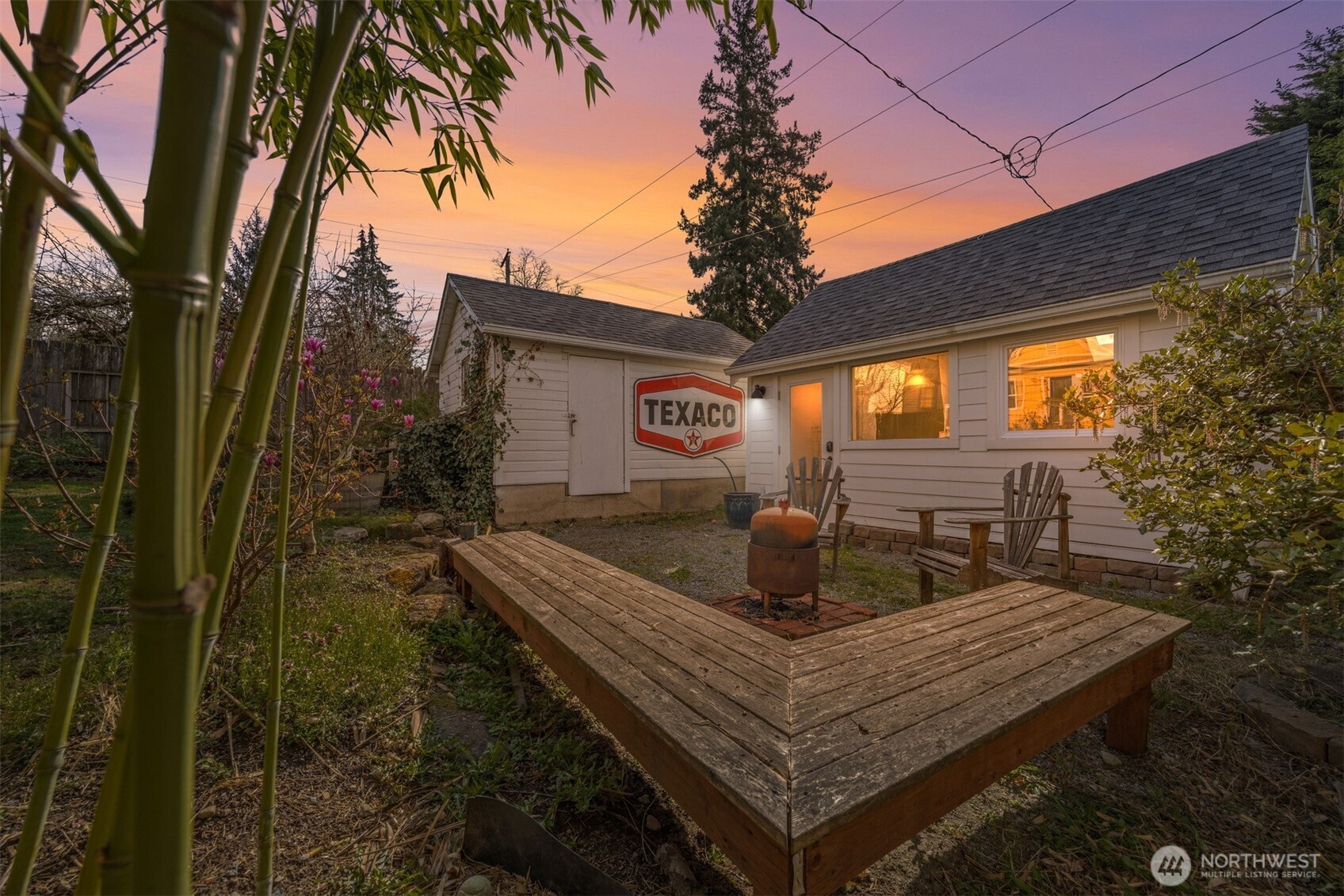 1205 Humboldt Street Bellingham, WA 98225 - Photo 39 of 40 a backyard of a house with table and chairs