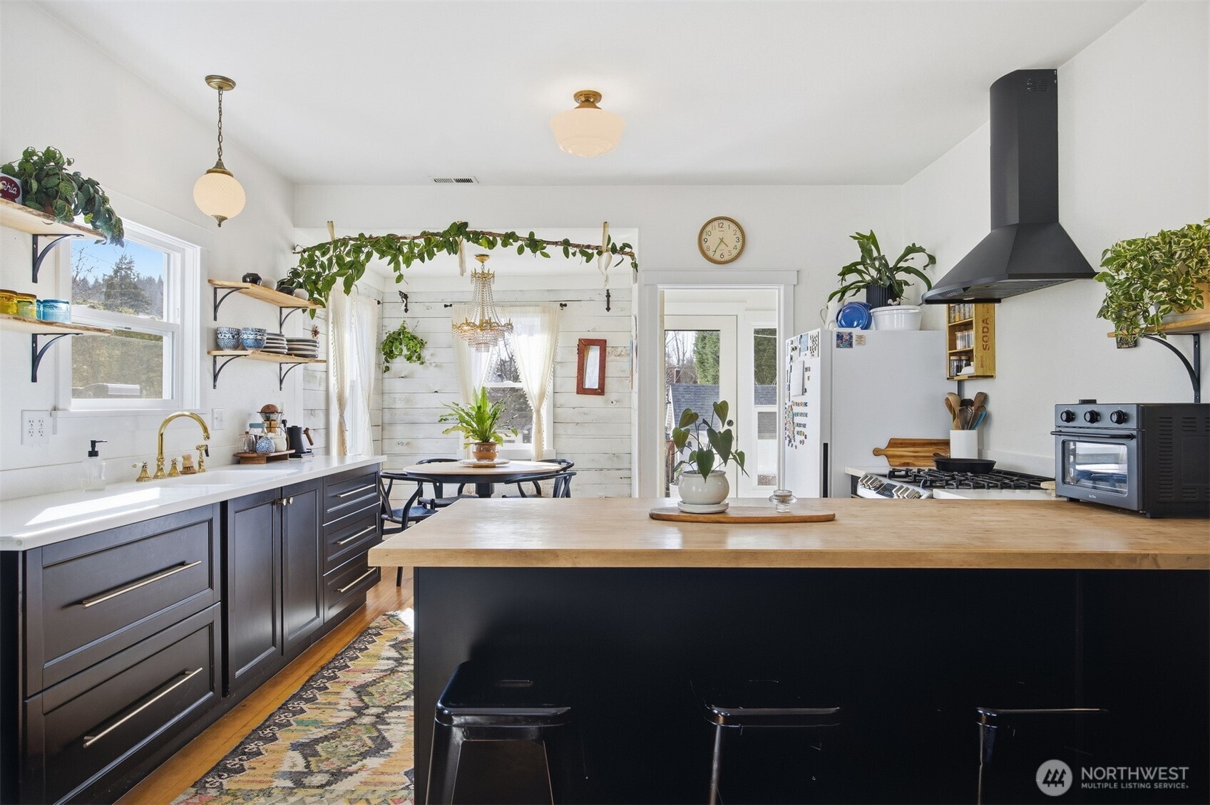 1205 Humboldt Street Bellingham, WA 98225 - Photo 10 of 40 a large kitchen with a table and chairs