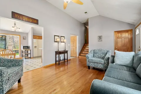 a living room with furniture and a table