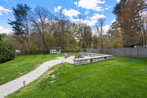 a view of a swimming pool with a garden