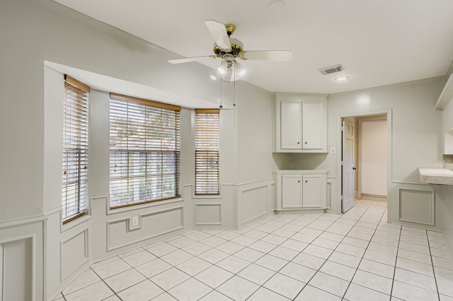 8518 Rebawood Drive Humble, TX 77346 - Photo 11 of 36 This kitchen features a breakfast nook and two versatile breakfast bars, perfect for casual dining and entertaining.