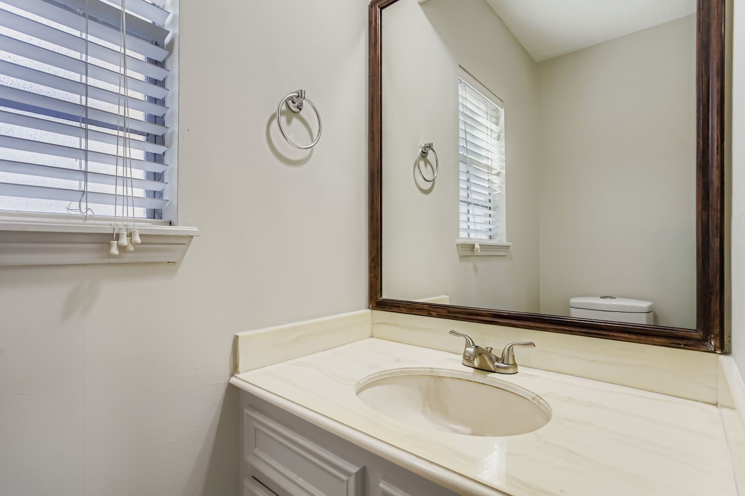 8518 Rebawood Drive Humble, TX 77346 - Photo 14 of 36 This conveniently located half bath off the kitchen and laundry room offers your guests privacy and ease.