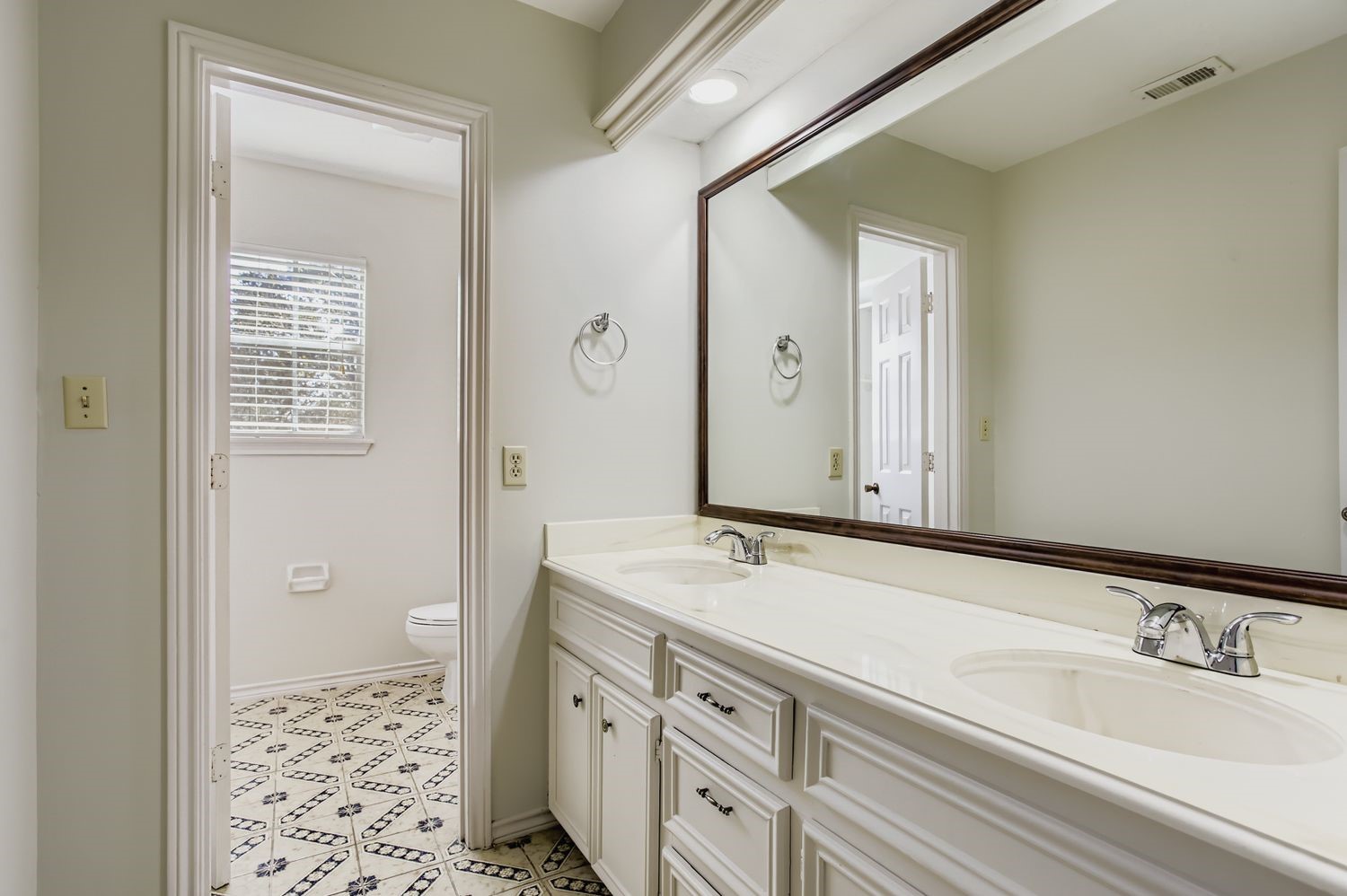 8518 Rebawood Drive Humble, TX 77346 - Photo 21 of 36 Secondary bathroom upstairs contains dual sinks and plenty of cabinet space to share