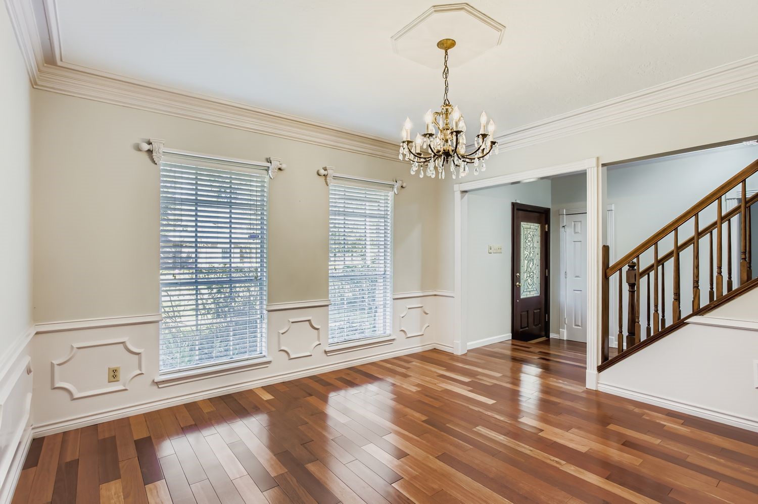 8518 Rebawood Drive Humble, TX 77346 - Photo 6 of 36 This elegant formal dining room, situated at the front of the home, offers graceful charm and seamless access to the kitchen, perfect for effortless entertaining.
