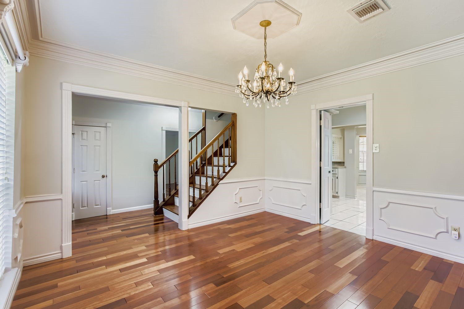8518 Rebawood Drive Humble, TX 77346 - Photo 7 of 36 This spacious dining room seamlessly connects to the kitchen, entryway, and an inviting staircase leading to the second floor, creating a perfect flow for entertaining and daily living.