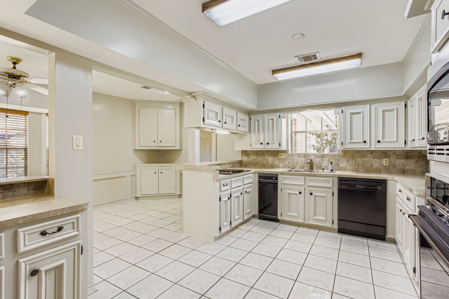 8518 Rebawood Drive Humble, TX 77346 - Photo 8 of 36 This well-appointed kitchen invites seamless movement while preparing meals or snacks, making it perfect for hosting family and friends.