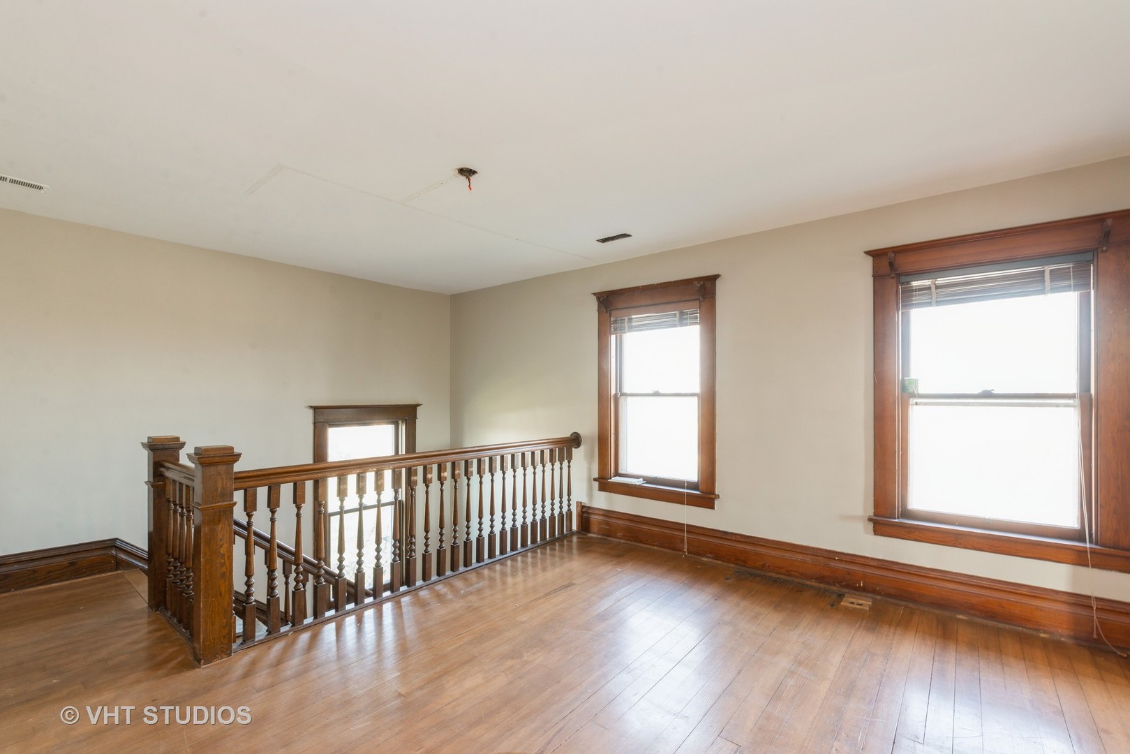 2N100 Brundige Road Elburn, IL 60119 - Photo 17 of 34 a view of a room with wooden floor windows and fireplace