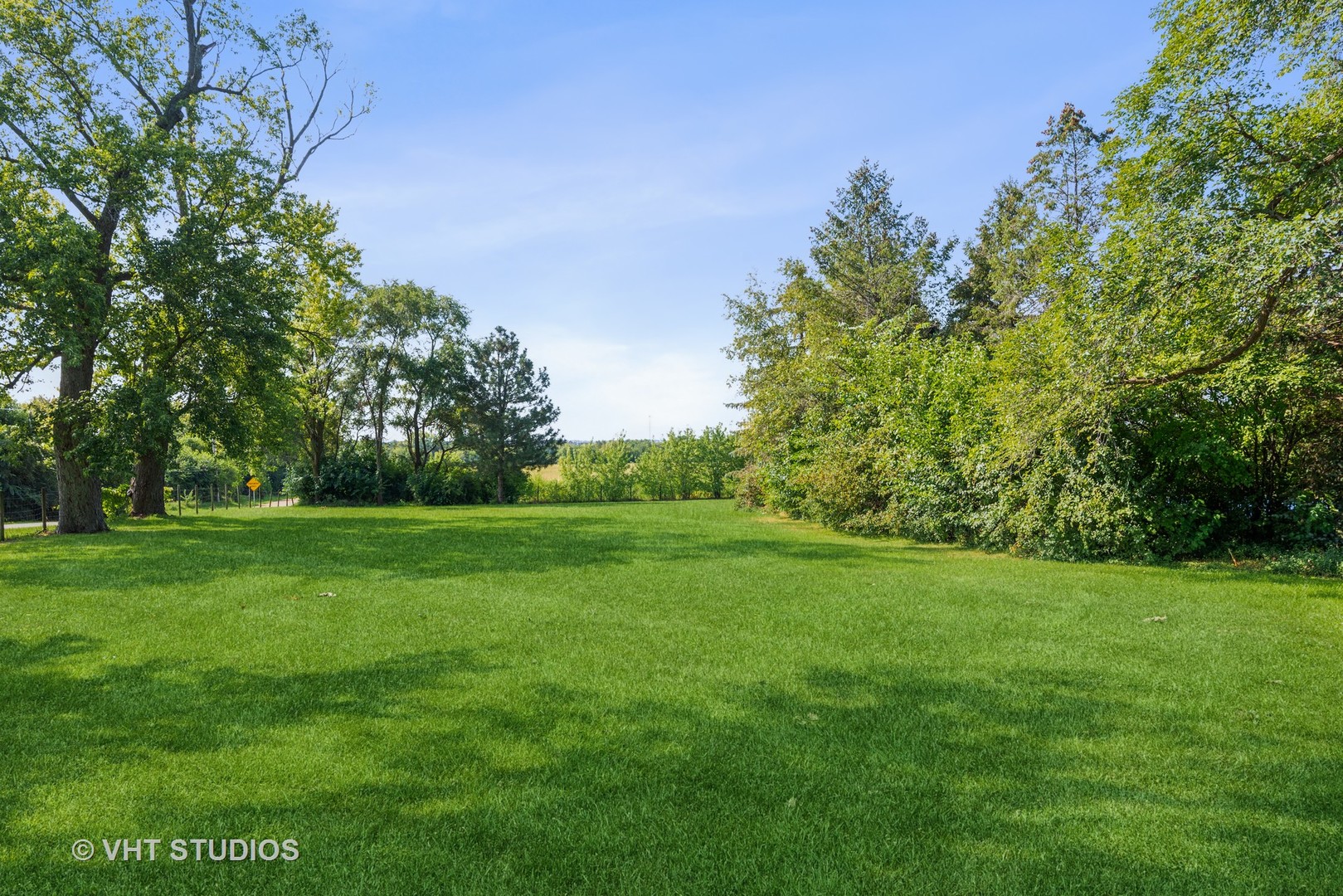 2N100 Brundige Road Elburn, IL 60119 - Photo 3 of 34 a view of a grassy field with trees