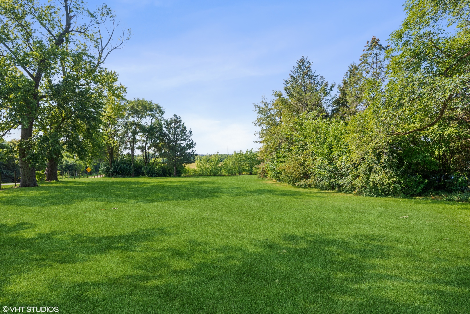 2N100 Brundige Road Elburn, IL 60119 - Photo 34 of 34 a view of a grassy field with trees