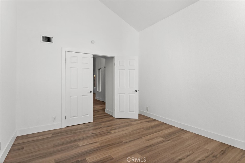 16 Encina Irvine, CA 92620 - Photo 11 of 37 a view of an empty room with wooden floor