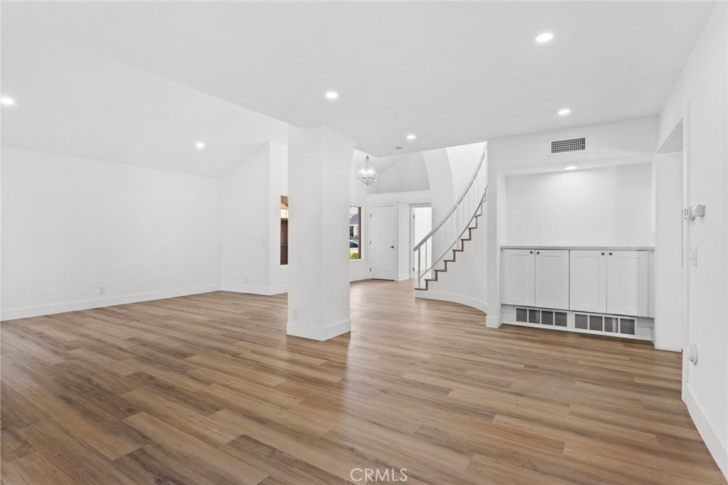 16 Encina Irvine, CA 92620 - Photo 14 of 37 a view of an empty room with wooden floor