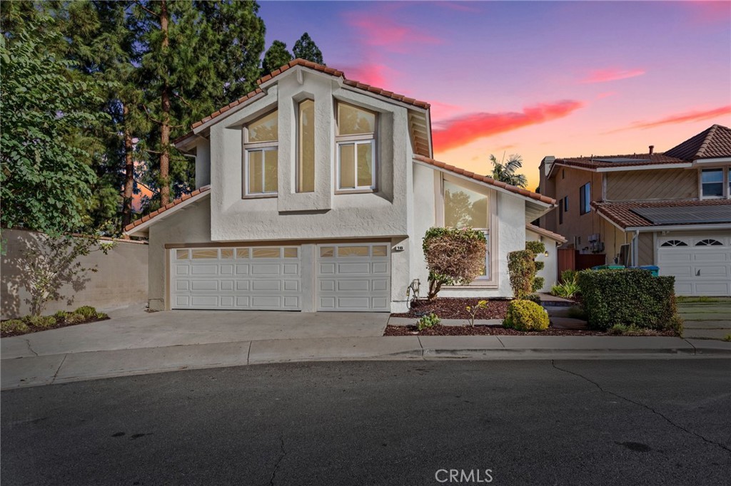 16 Encina Irvine, CA 92620 - Photo 2 of 37 a front view of a house with a street