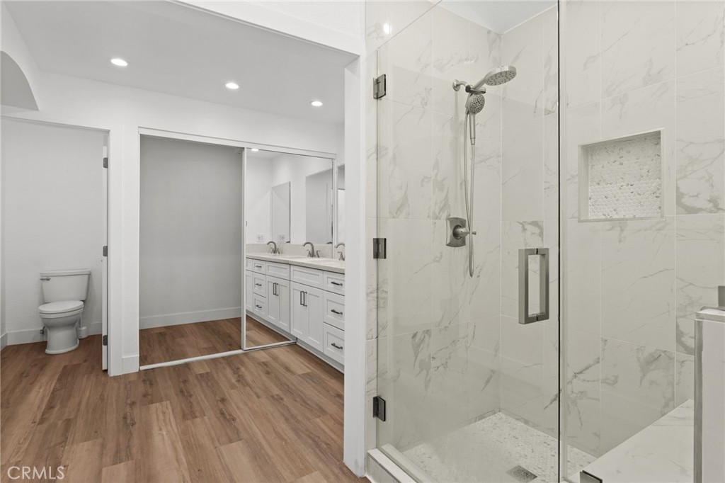 16 Encina Irvine, CA 92620 - Photo 21 of 37 a bathroom with a shower and a toilet