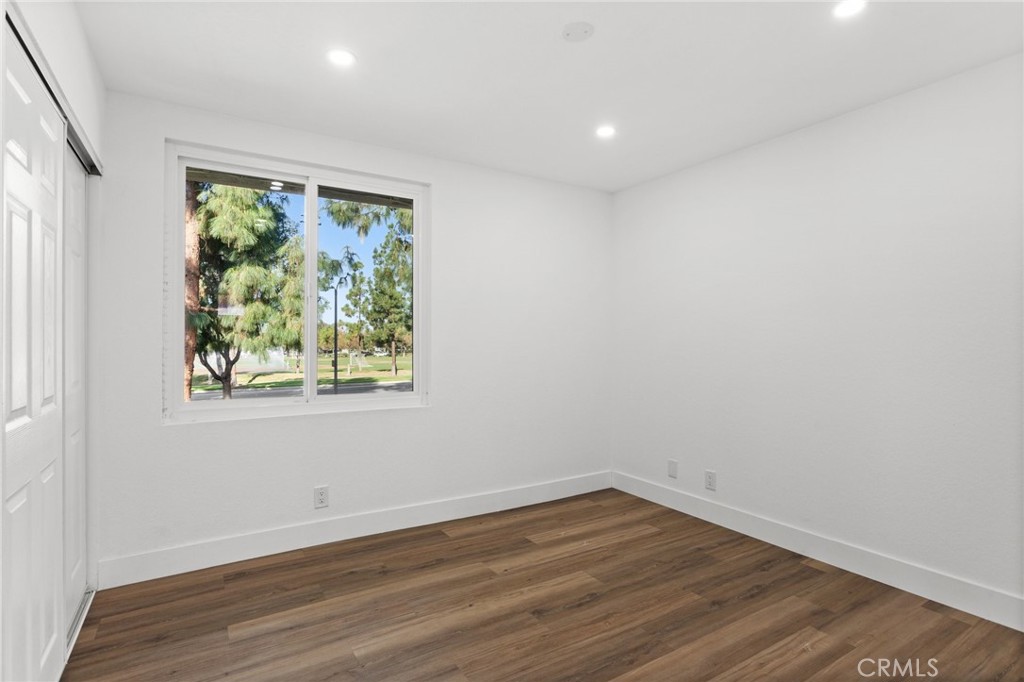 16 Encina Irvine, CA 92620 - Photo 22 of 37 an empty room with wooden floor and window