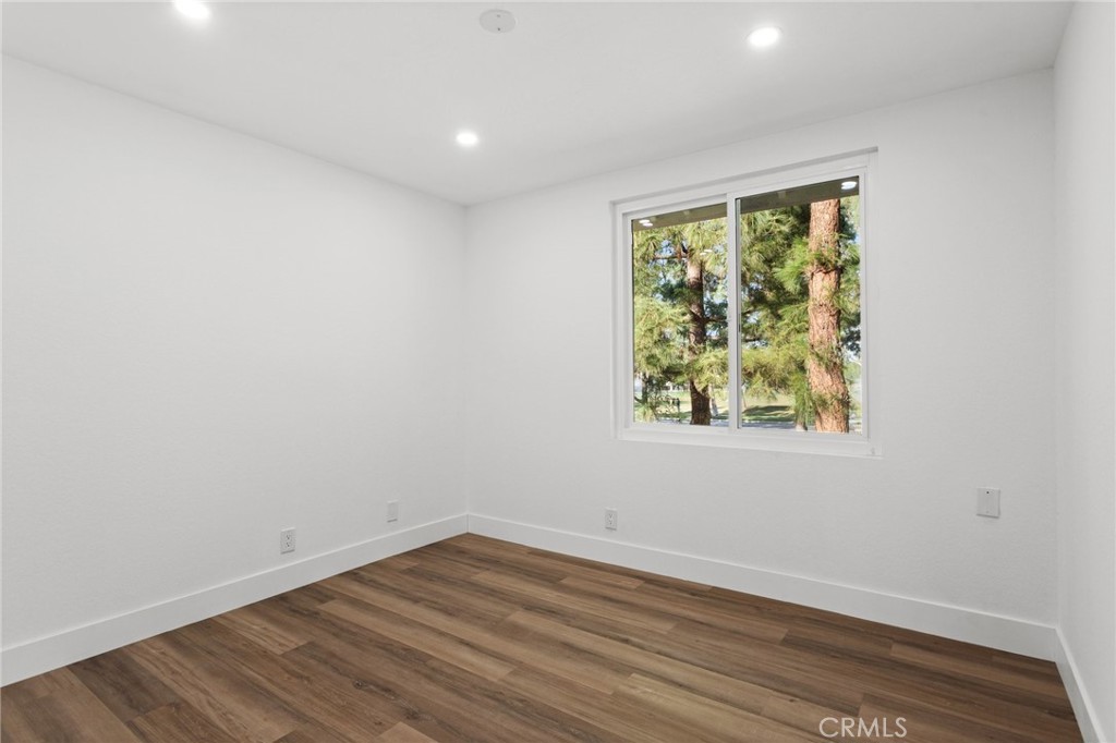 16 Encina Irvine, CA 92620 - Photo 24 of 37 an empty room with wooden floor and window
