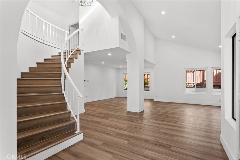 16 Encina Irvine, CA 92620 - Photo 8 of 37 a view of entryway and hall with wooden floor