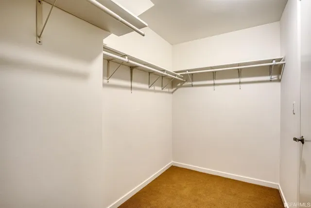 a view of a room with racks on the wall