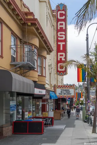 a view of city with the shops and fruits market
