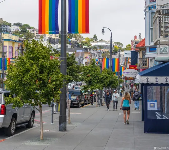 a group of people walking down a street