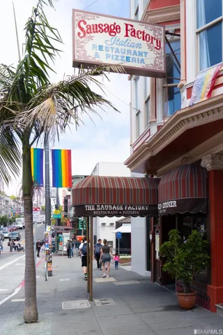 a view of shops on the street