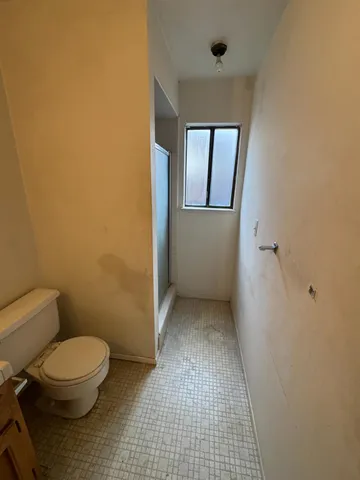 a bathroom with a toilet