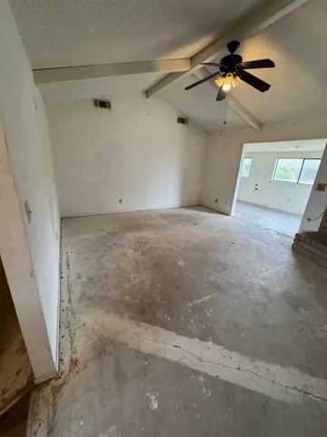 a view of a livingroom with a ceiling fan