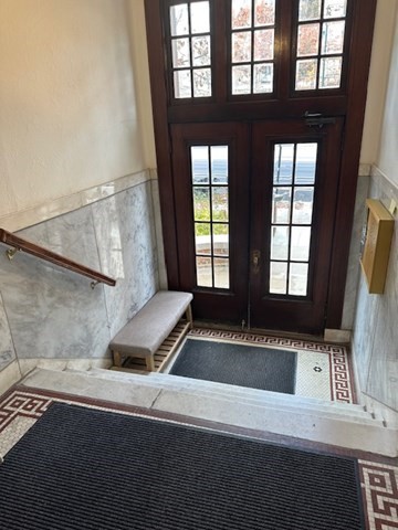 1521 Beacon Street, Unit 1 Brookline, MA 02446 - Photo 14 of 15 a view of an empty room with windows