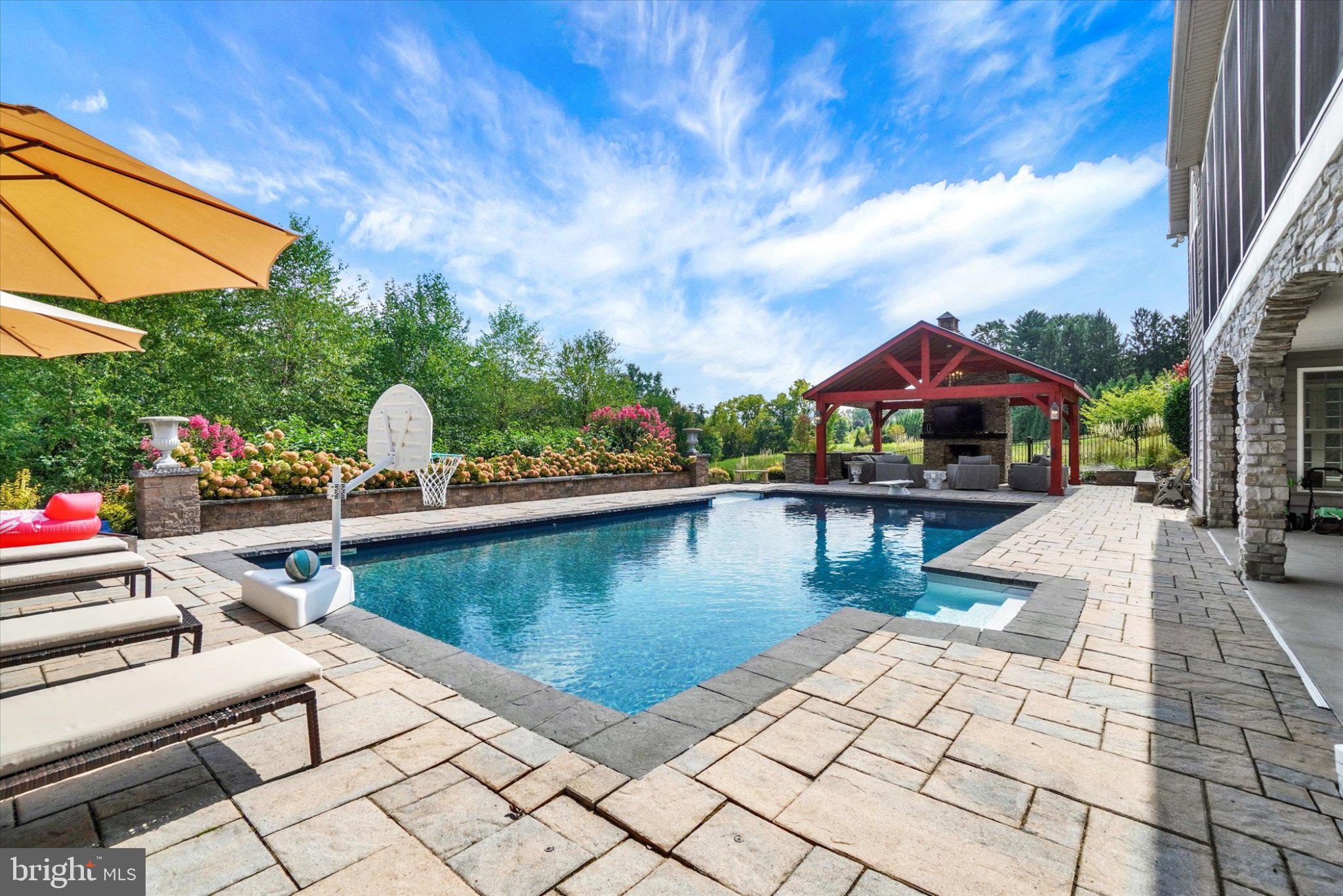 2811 Iron Stone Hill Road York, PA 17403 - Photo 40 of 60 Brick paver decking around the pool