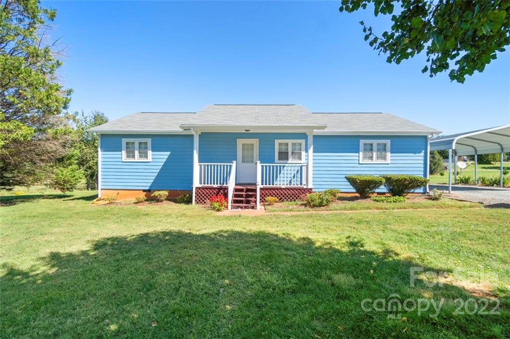 110 Haystack Lane Olin, NC 28660 - Photo 3 of 28 a view of a house with a backyard