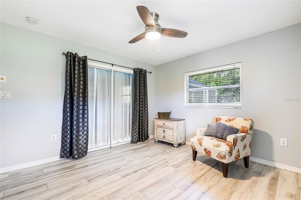 28522 Coco Palm Drive Punta Gorda, FL 33982 - Photo 14 of 54 a living room with furniture and a window