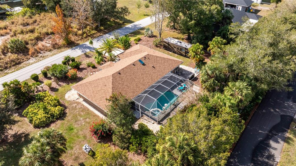 28522 Coco Palm Drive Punta Gorda, FL 33982 - Photo 38 of 54 an aerial view of a house with a yard