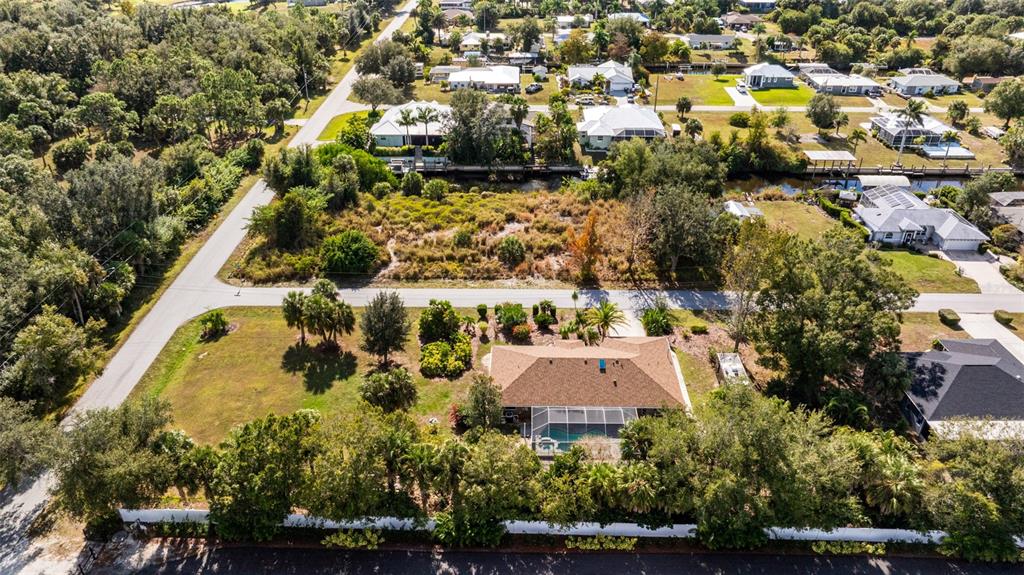 28522 Coco Palm Drive Punta Gorda, FL 33982 - Photo 47 of 54 an aerial view of residential house with outdoor space and trees