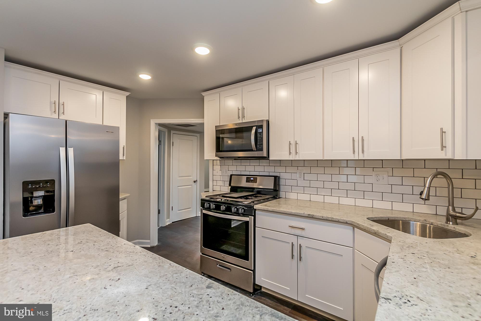 7306 Old Harford Road Baltimore, MD 21234 - Photo 11 of 35 Kitchen and Hallway Entrance