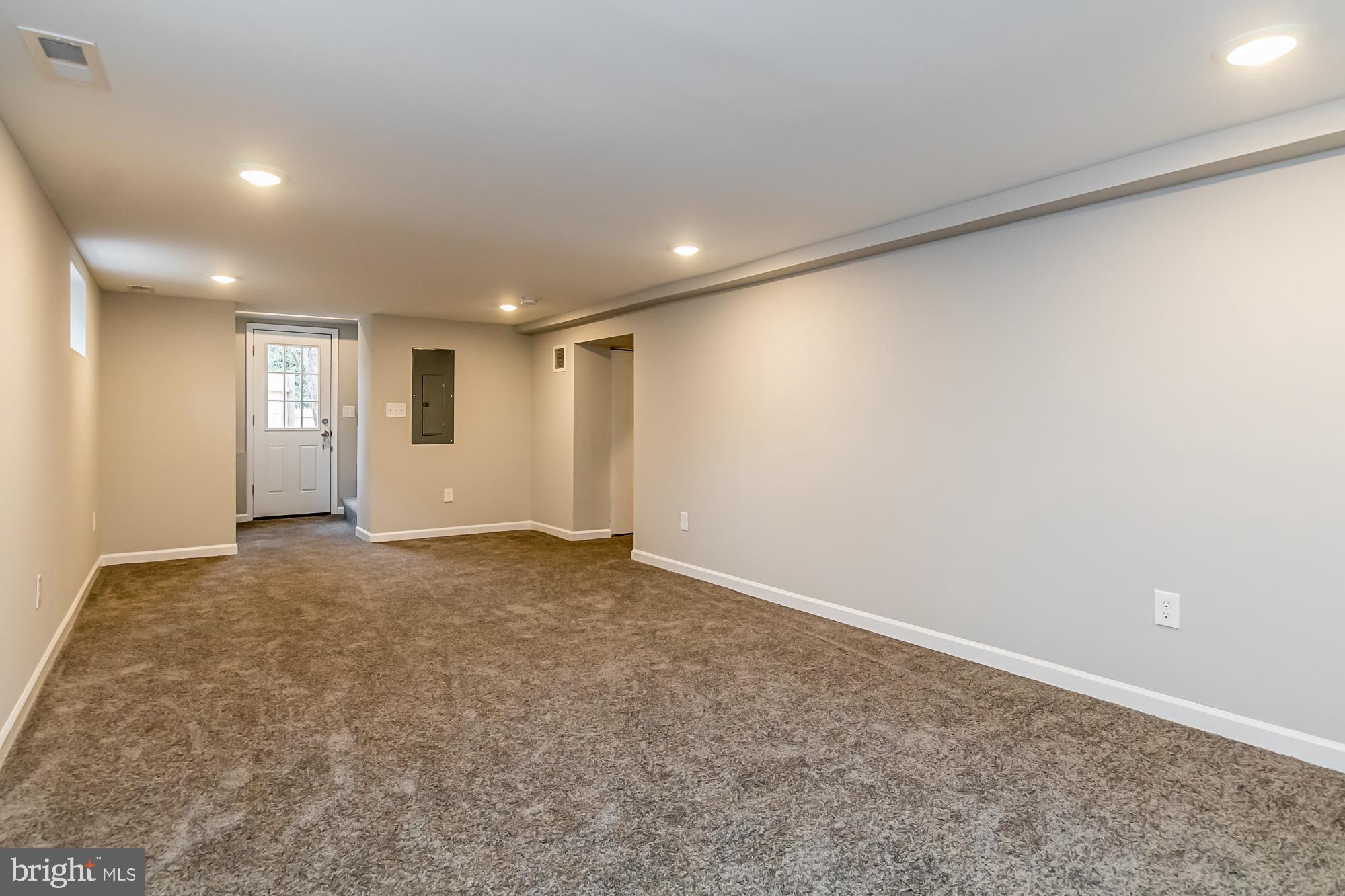 7306 Old Harford Road Baltimore, MD 21234 - Photo 30 of 35 Lower Level Club Rm Walkout to Yard & Garage