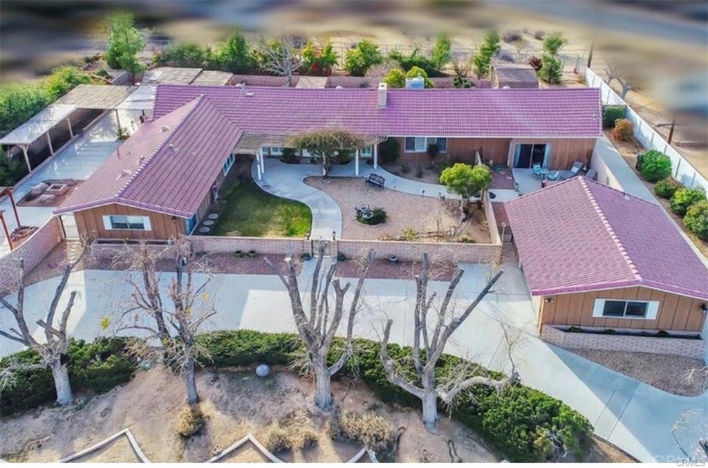 15030 Genesee Road Apple Valley, CA 92307 - Photo 1 of 1 an aerial view of a house with garden space and street view