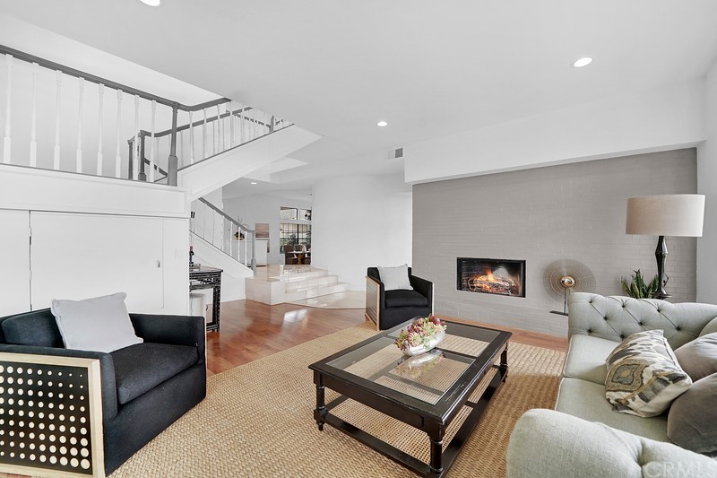 23 Coventry Newport Beach, CA 92660 - Photo 5 of 16 a living room with furniture and a couch