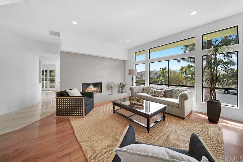 23 Coventry Newport Beach, CA 92660 - Photo 8 of 16 a living room with furniture and floor to ceiling window