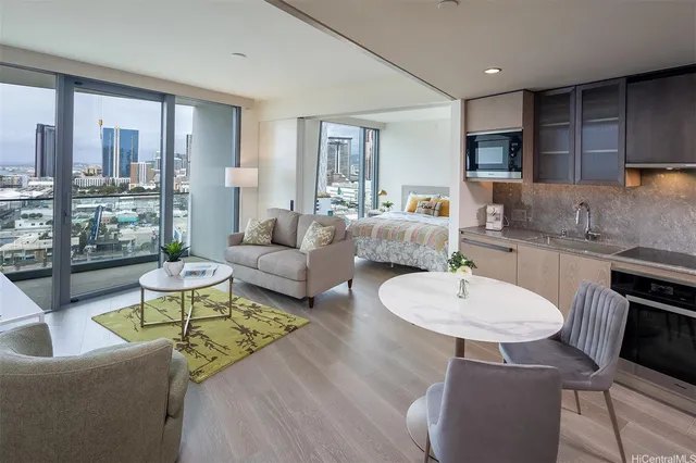 a living room with furniture and a large window