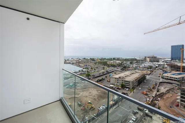 a city view from a balcony with city view