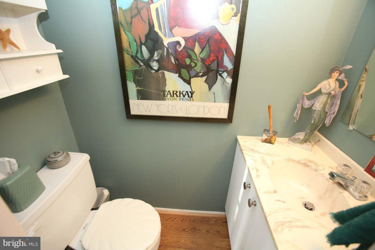 14 Stone Ridge Court, Unit 25 Baltimore, MD 21239 - Photo 14 of 30 a bathroom with a toilet and a sink