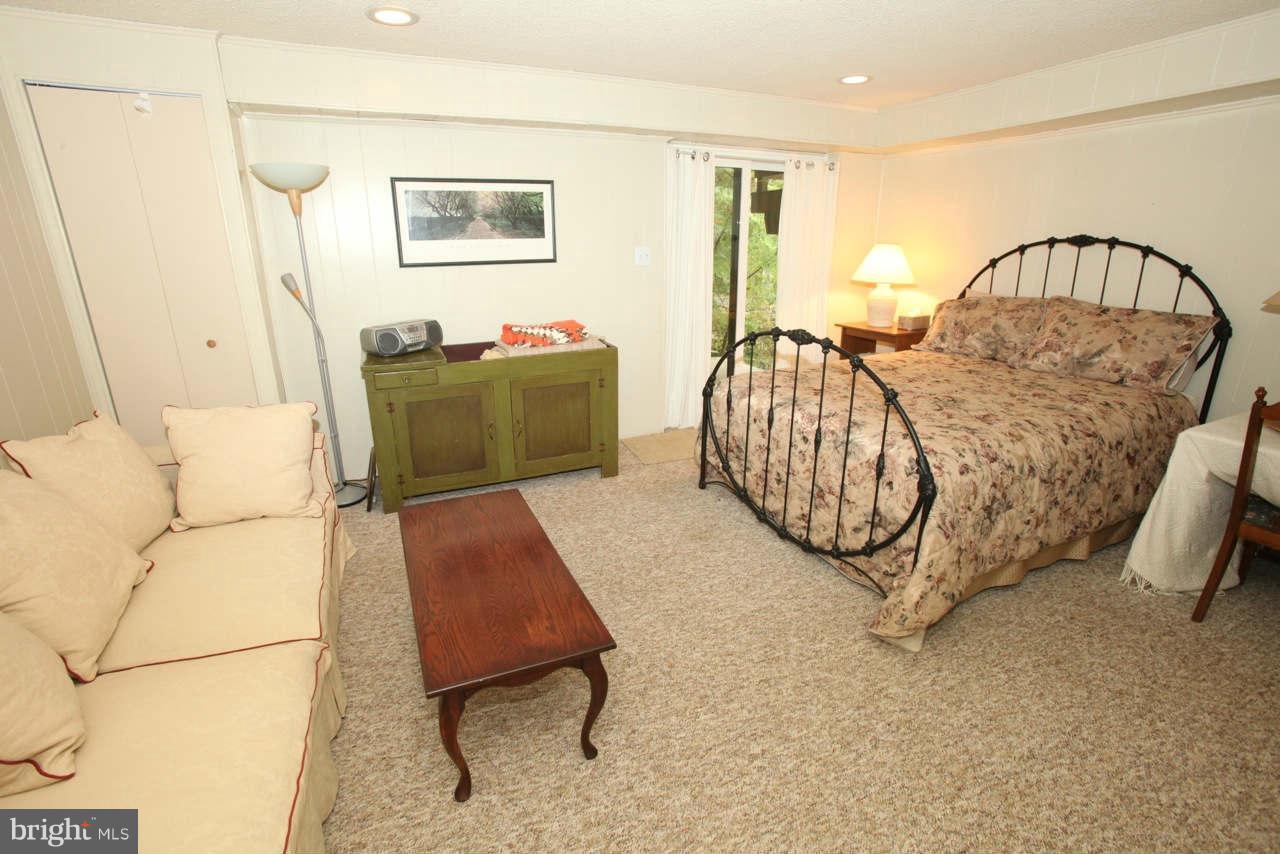 14 Stone Ridge Court, Unit 25 Baltimore, MD 21239 - Photo 21 of 30 a living room with furniture