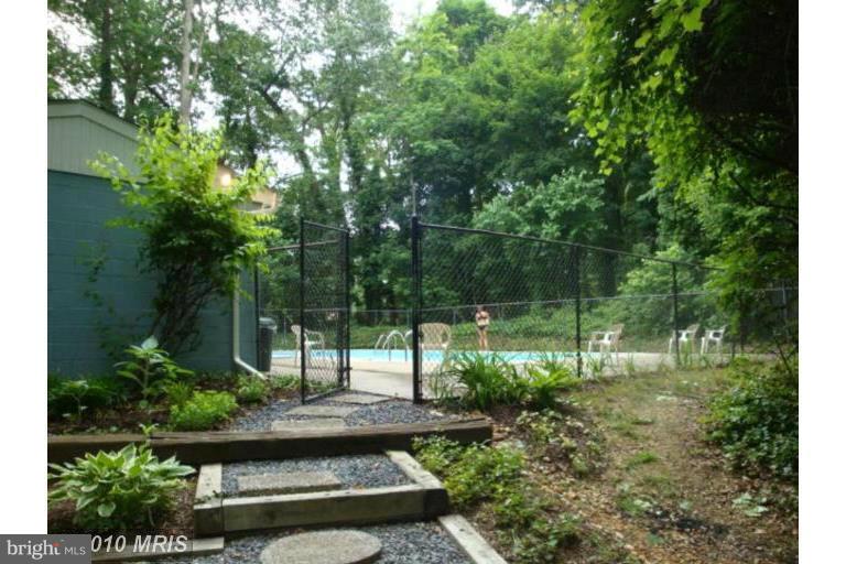 14 Stone Ridge Court, Unit 25 Baltimore, MD 21239 - Photo 28 of 30 a view of a garden with plants