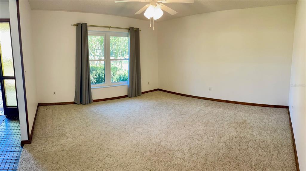 4524 Southeast 11th Place Ocala, FL 34471 - Photo 4 of 31 an empty room with a window