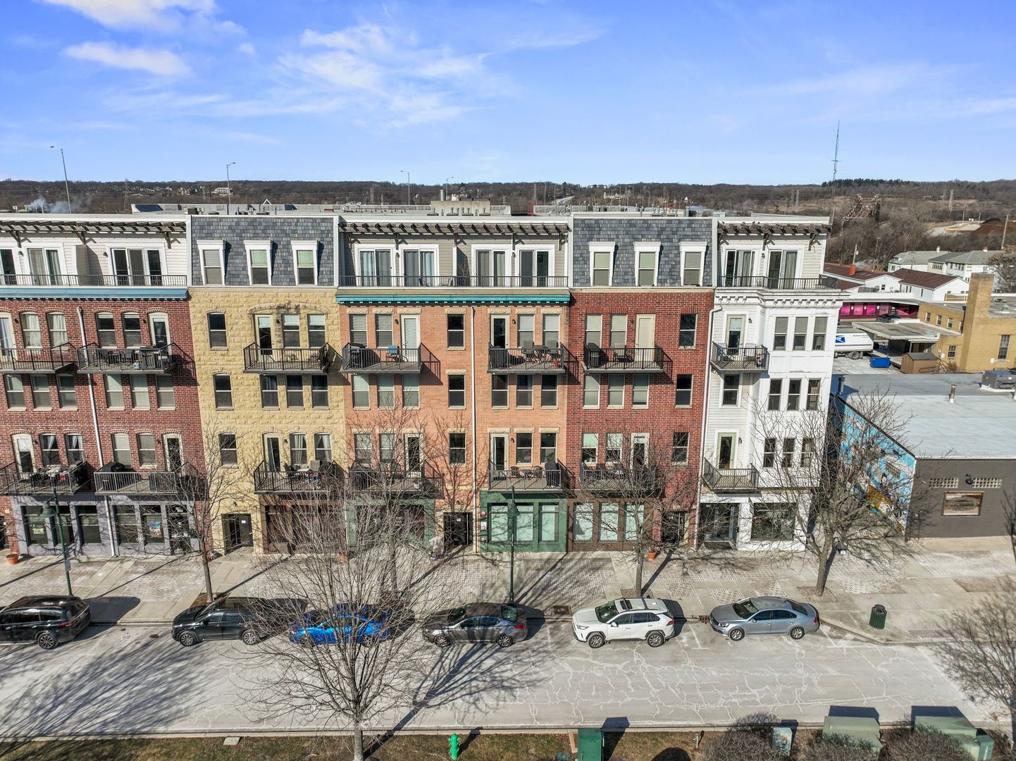 351 Front Street, Unit 2212 Lemont, IL 60439 - Photo 2 of 36 a view of a city that has tall buildings