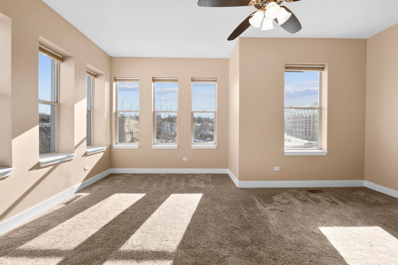 351 Front Street, Unit 2212 Lemont, IL 60439 - Photo 27 of 36 a view of an empty room with a window