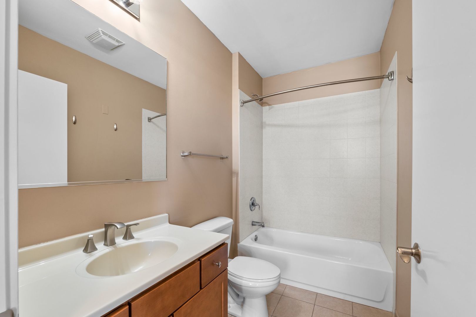 351 Front Street, Unit 2212 Lemont, IL 60439 - Photo 34 of 36 a bathroom with a sink toilet and shower