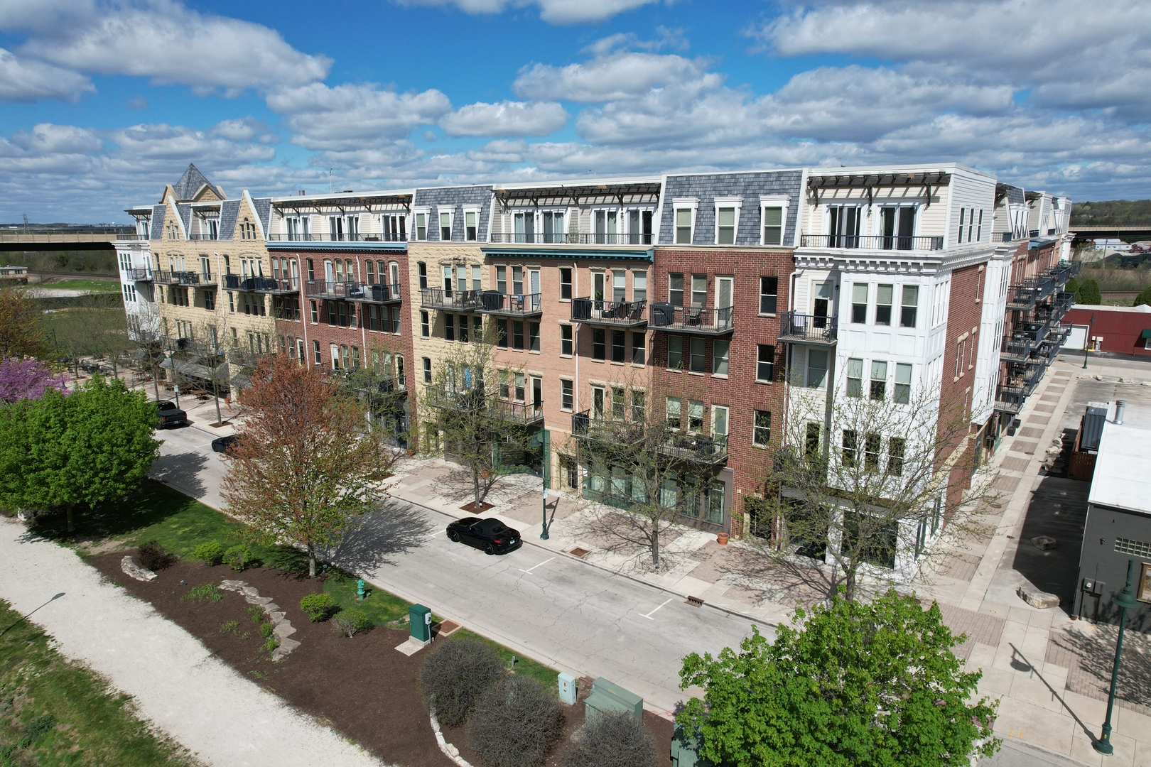 351 Front Street, Unit 2212 Lemont, IL 60439 - Photo 4 of 36 a view of a house with backyard and sitting area