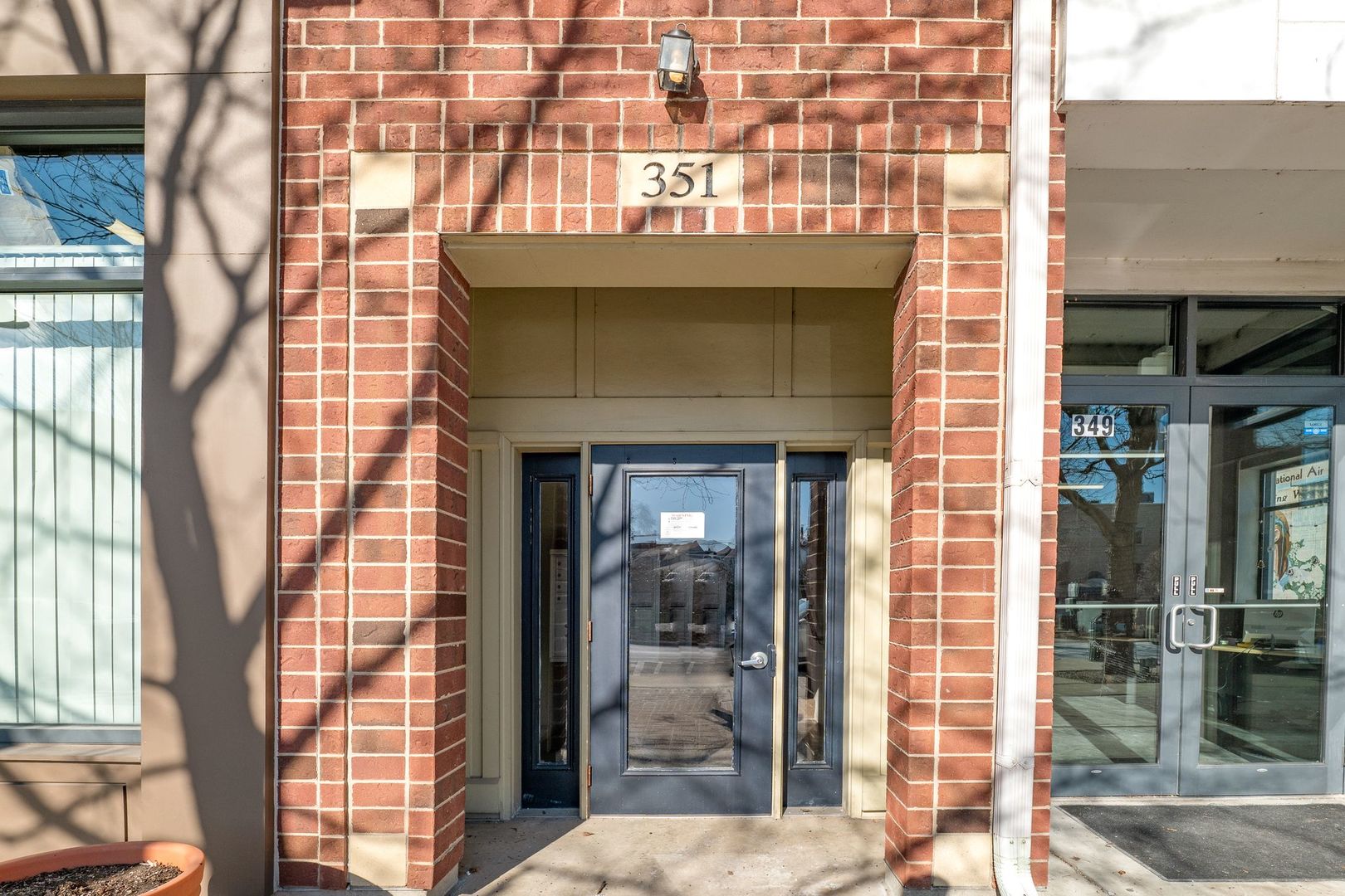 351 Front Street, Unit 2212 Lemont, IL 60439 - Photo 6 of 36 a front view of a house with a balcony